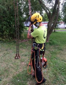 surgeon on harness - standing on ground ready to go up