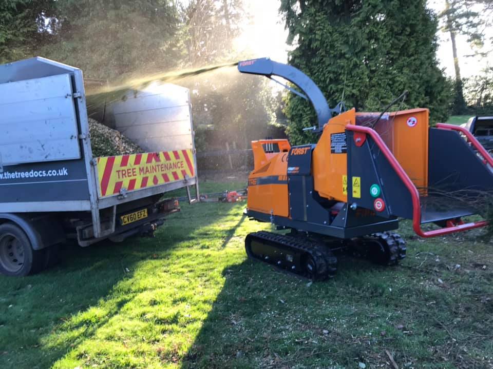 Wood Chippings being sprayed into tree maintenance pick up
