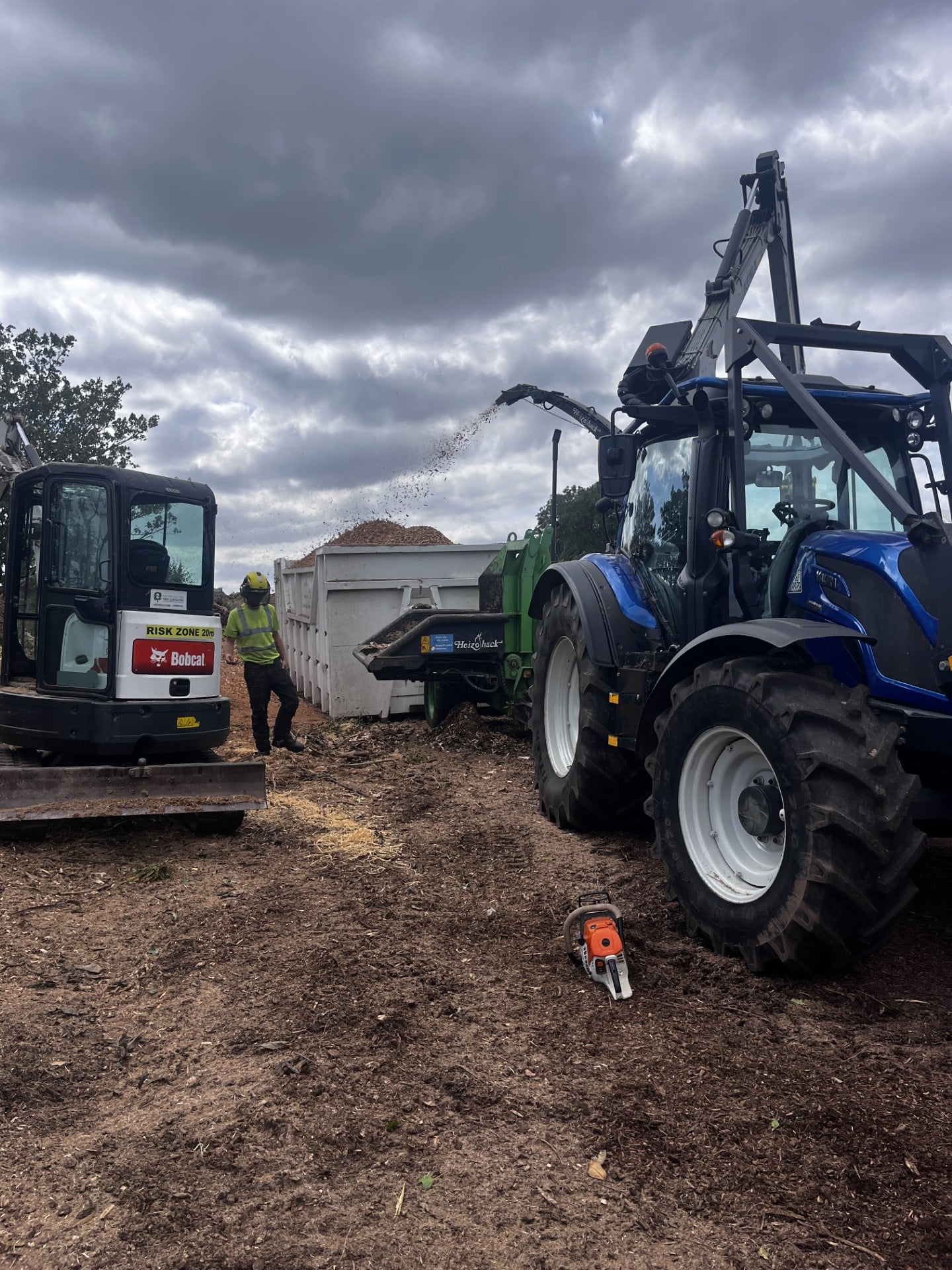 Biomass 01 mulching biomass with tractor